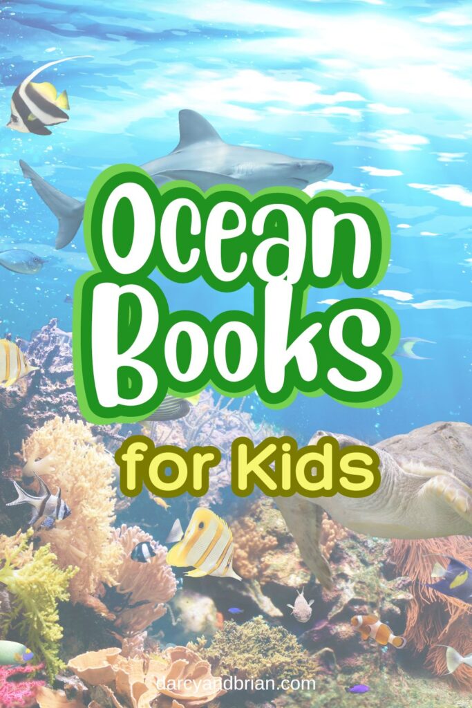 White text outlined in green says "Ocean Books" with yellow text underneath that says "for Kids." Text is on an image of a shark and fish swimming.