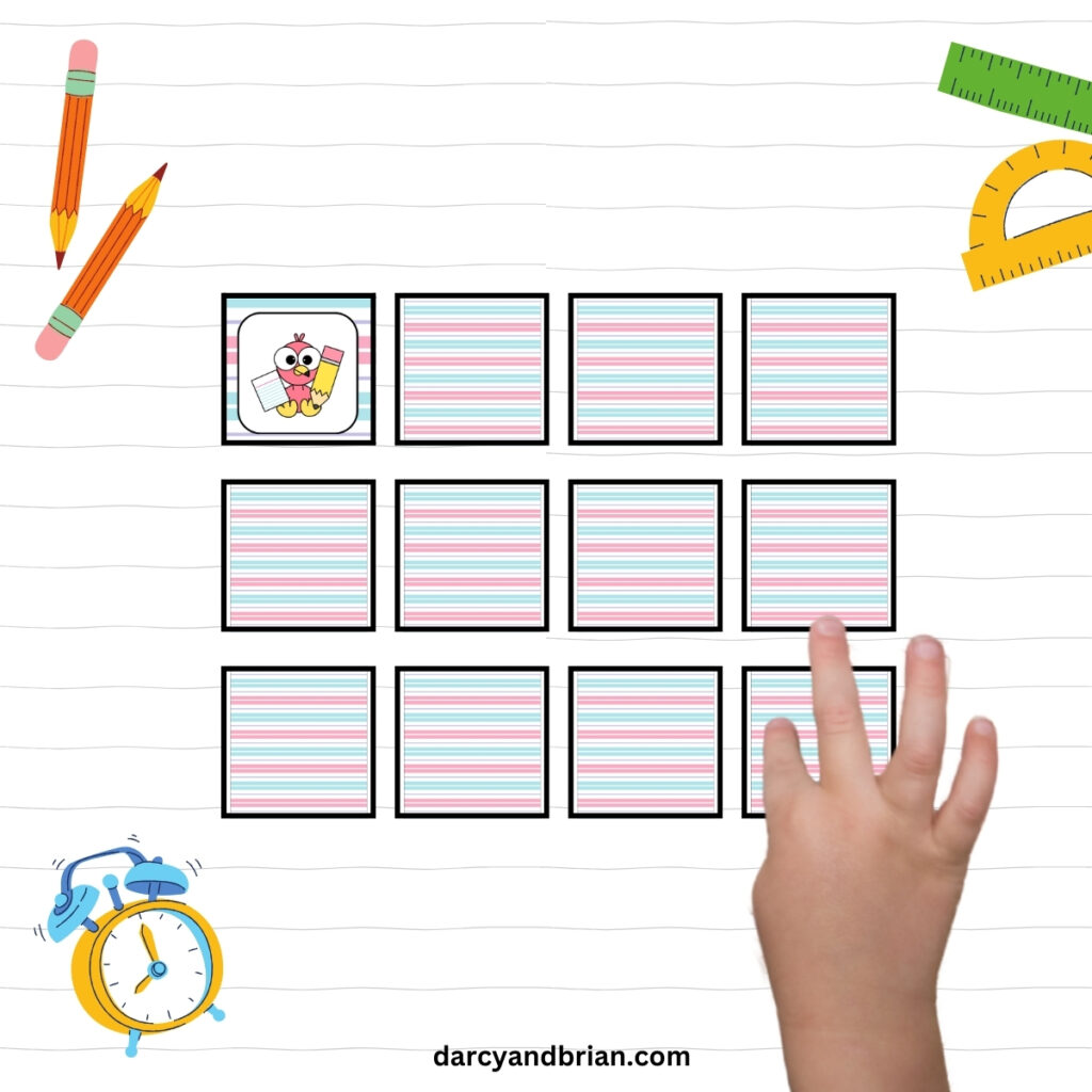 12 cards arranged in a grid. 11 are facedown. One is face up with a cute flamingo holding a pencil. A child's hand is selecting another card.