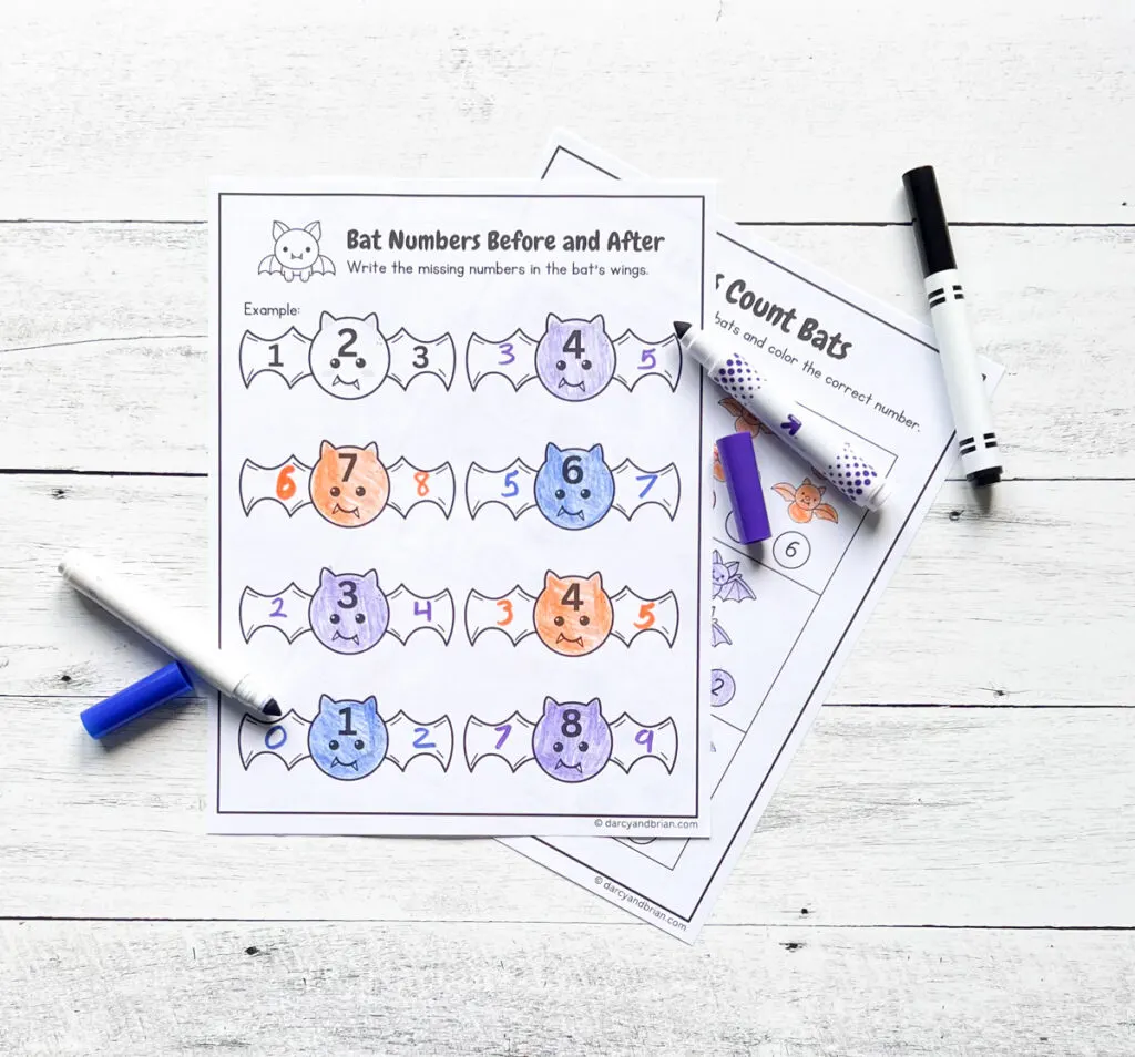 Two math worksheets overlapping. Top one features cute bats with a number on the body and fill in the numbers that go before and after on the wings.