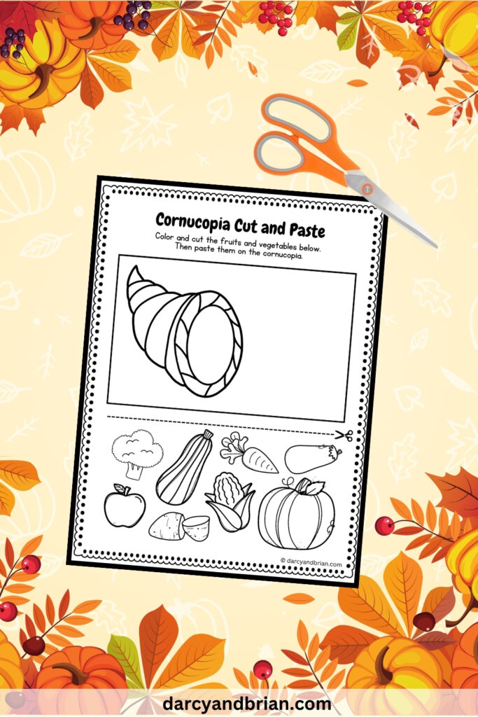 A page where you can cut and paste the fruits and vegetables. There's scissors as well placed in a light background with leaves and some pumpkins.