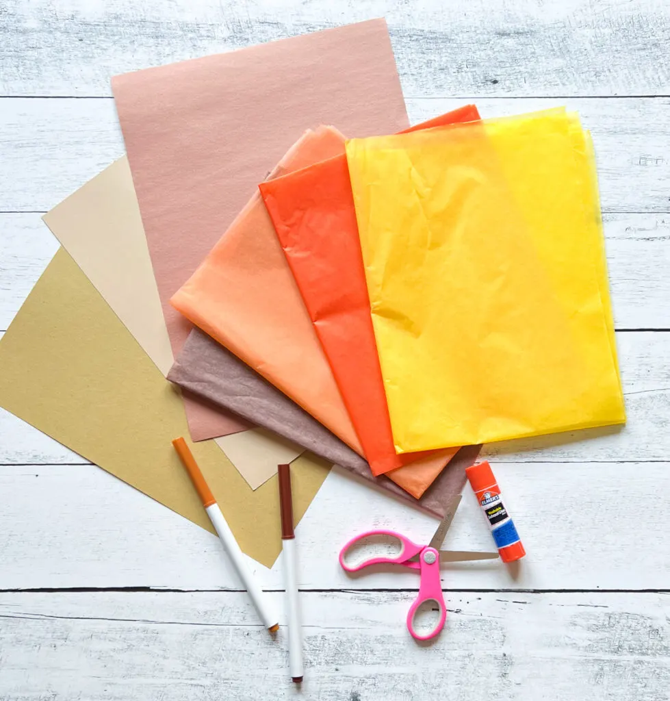 These have materials such as construction paper in yellow, red, orange, dark pink, and a brown thick paper for hand base. A glue stick, color pens, and scissors.