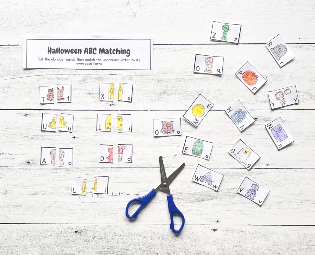 Upper and lowercase letter matching printable cards with Halloween-themed items.