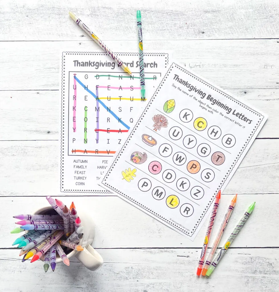 It has two pages of worksheets, Word Search and Beginning Letters, with some color pen, all placed in a wood background.