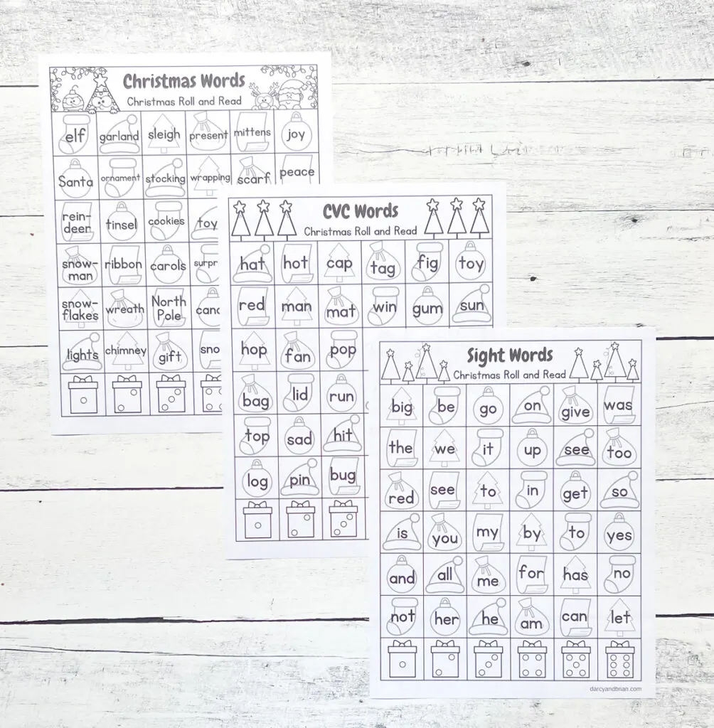 There are three pages of CVC worksheets with Christmas-themed words and design placed in a black and white wood backgroun.