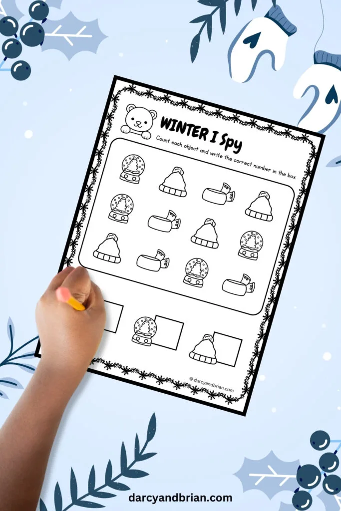 One worksheet of winter-themed I Spy activity with placed on a snowy background with winter objects.